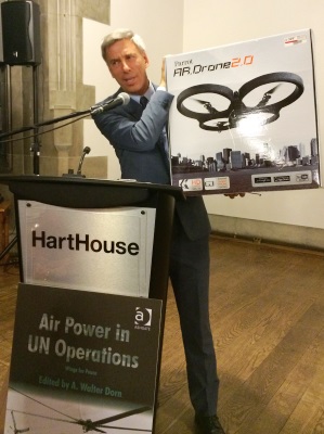 Dr. Dorn shows off his latest toy which he will bring to the UN: a UAV with UN headquarters on the box cover